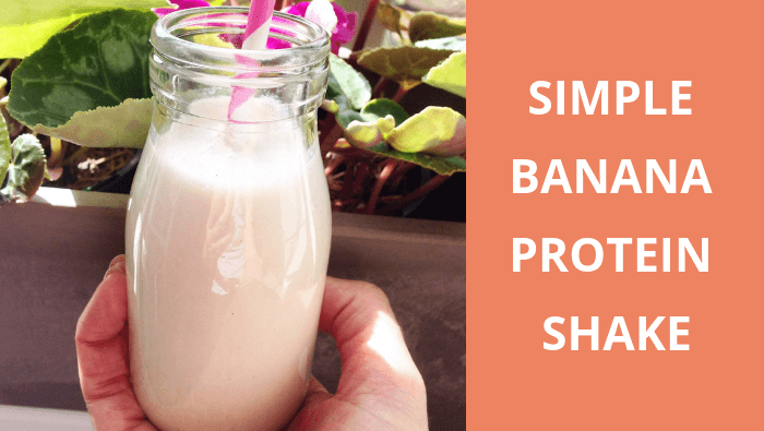 Banana protein recovery shake in a small milk bottle