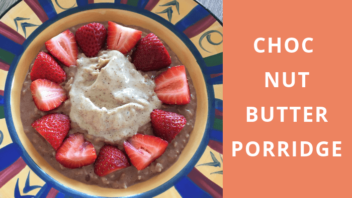 Choc nut butter porridge topped with strawberries blog header image