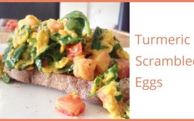 Turmeric scrambled eggs with spinach and tomatoes