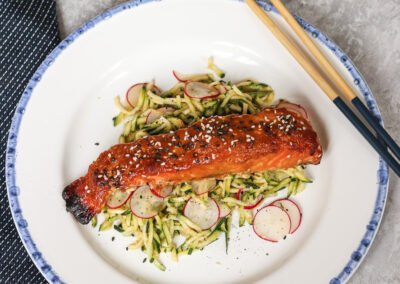 miso salmon on a bed of zucchini noodles