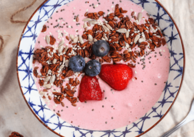 Strawberry protein smoothie bowl close up