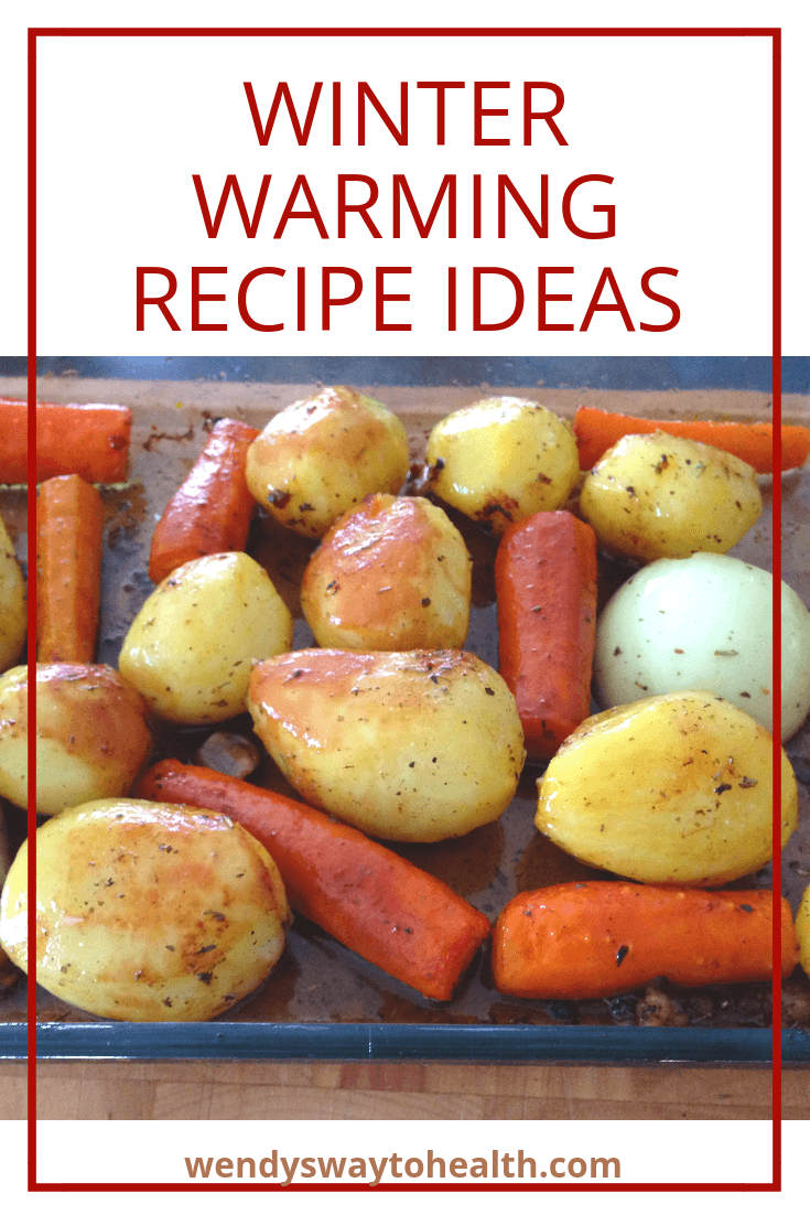 oven roasted potatoes and carrots in a glass dish