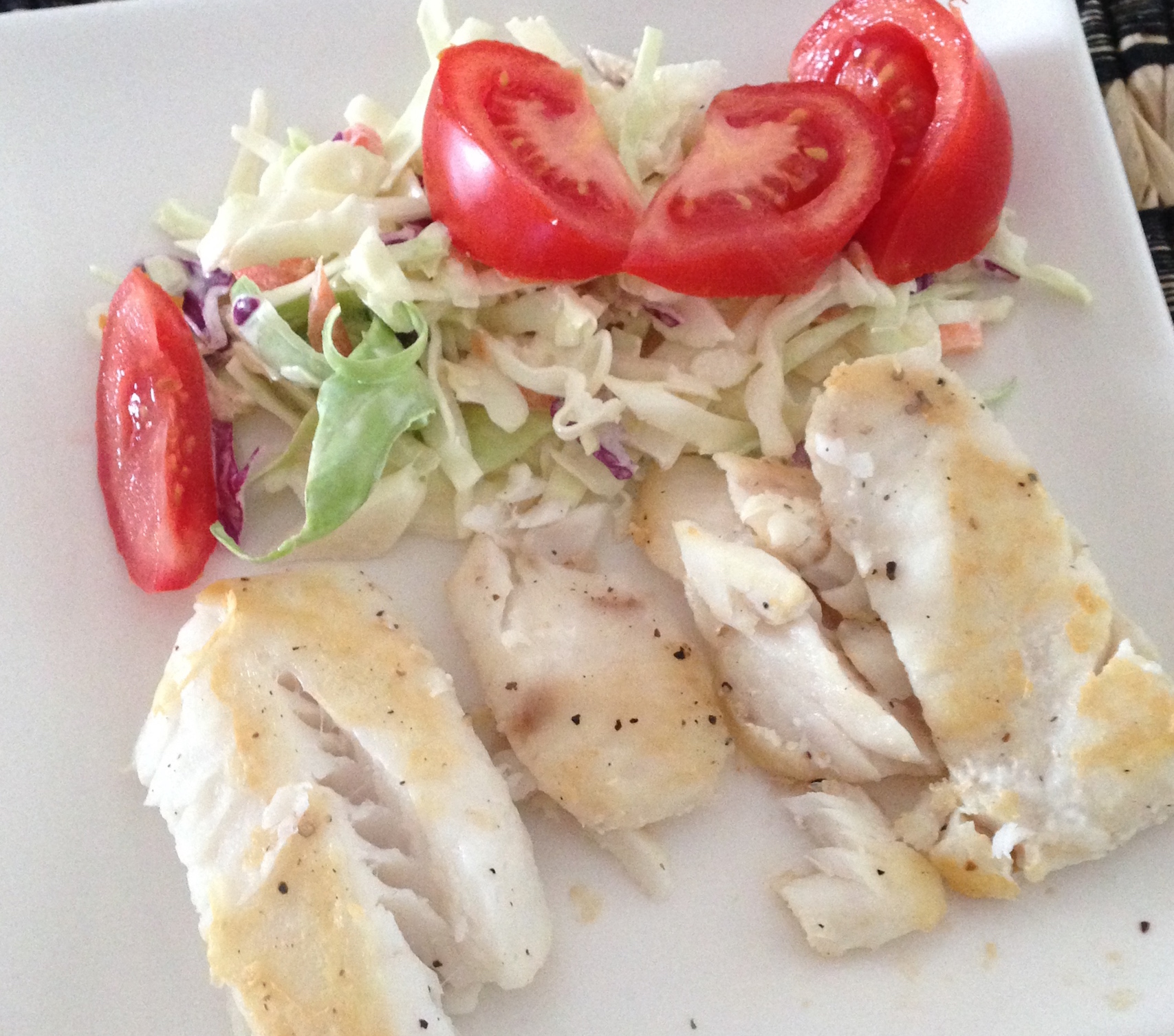 pan fried fish with a side salad