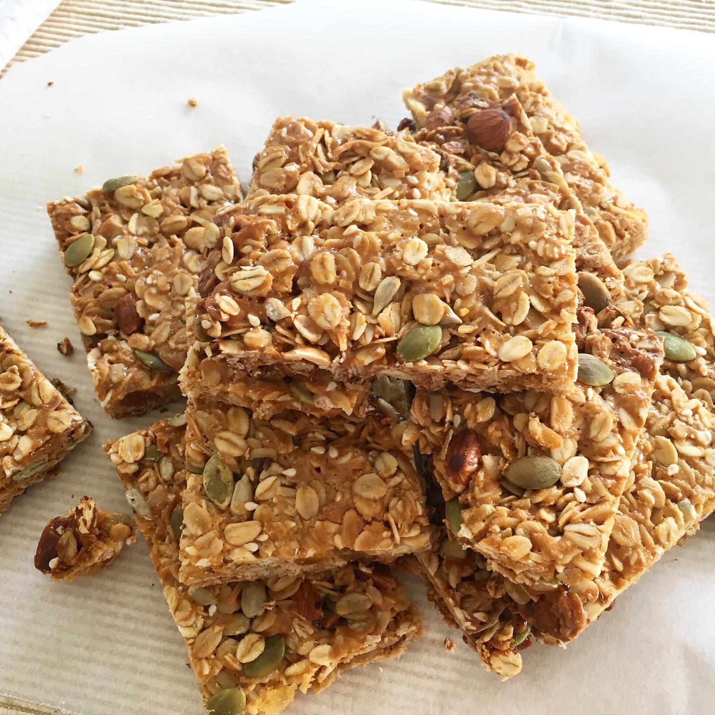 muesli bars stacked on a placemat