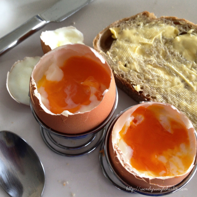 Close up of two boiled eggs in egg cups