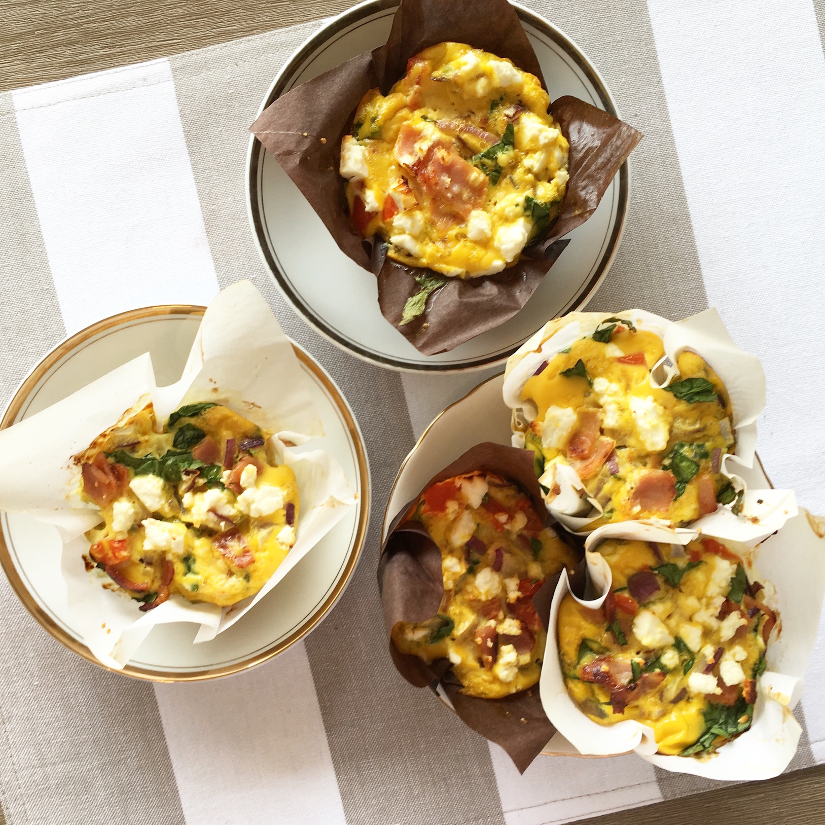 Easy egg muffins sitting on a placemat on a table
