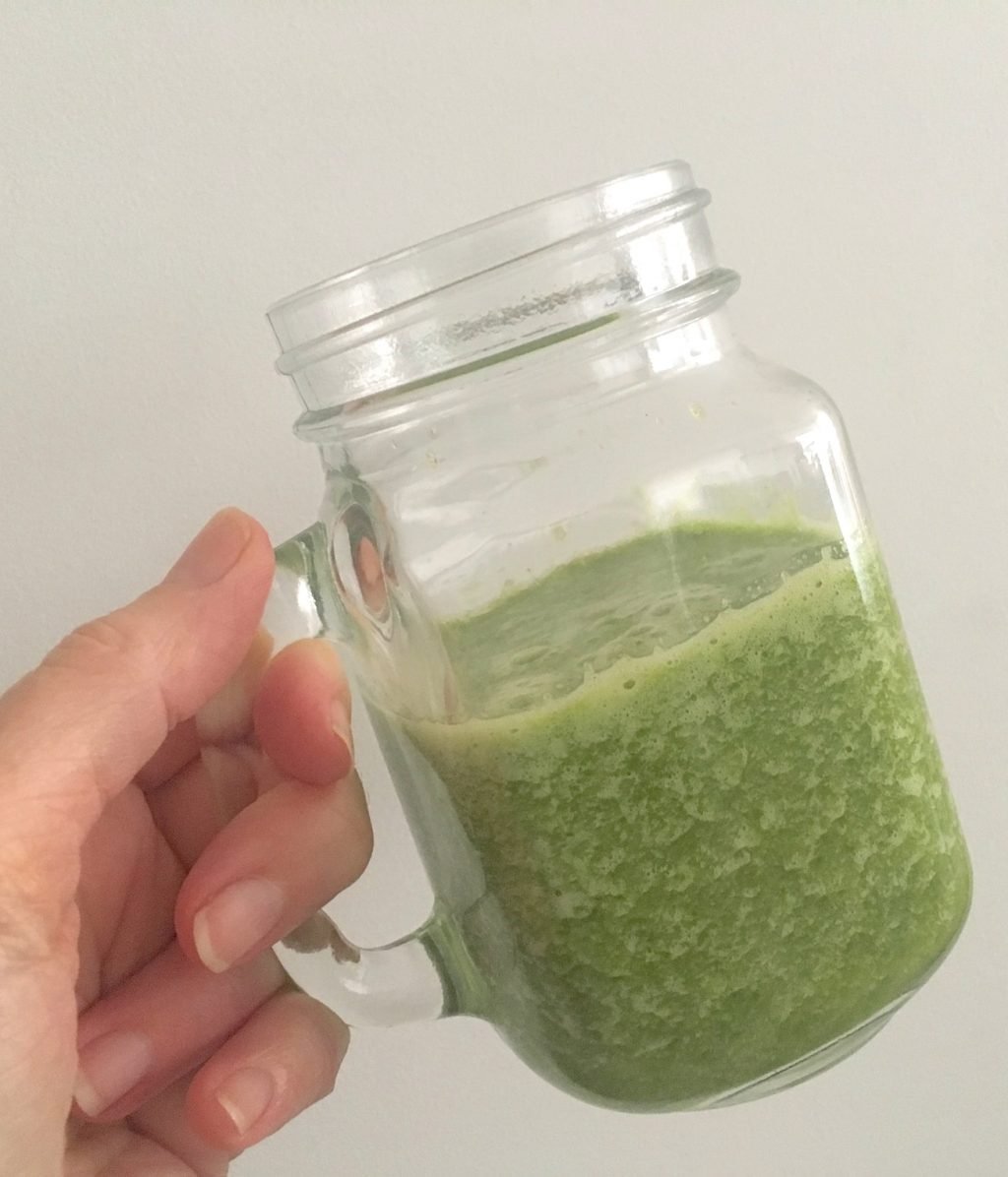 Close up of Winter green smoothie in a mason jar
