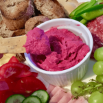 Beetroot dip on a sharing platter