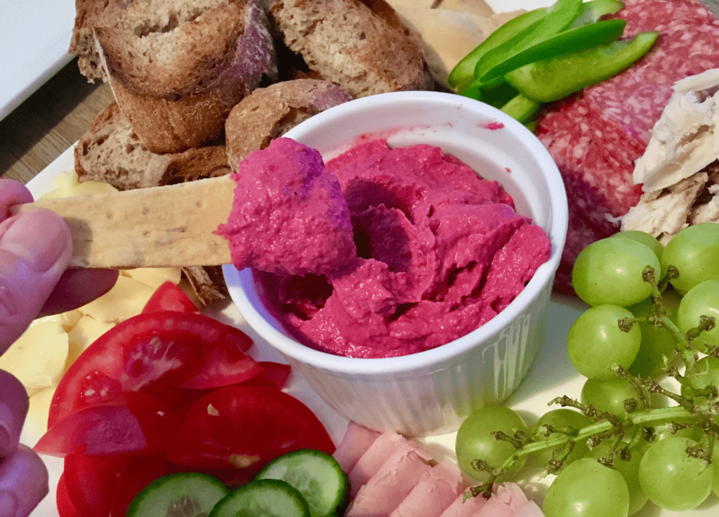 Beetroot dip on a sharing platter