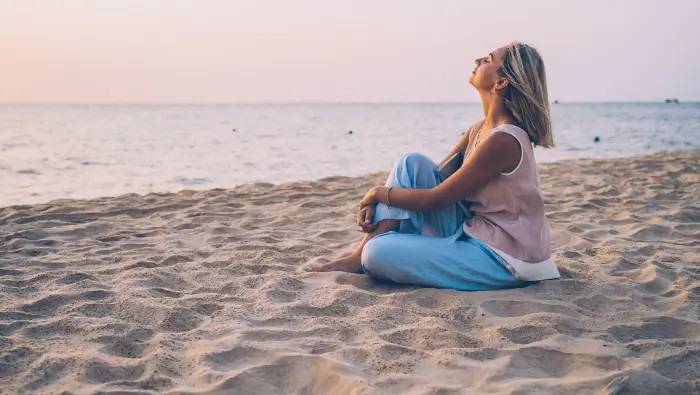 Woman relaxing at the beach