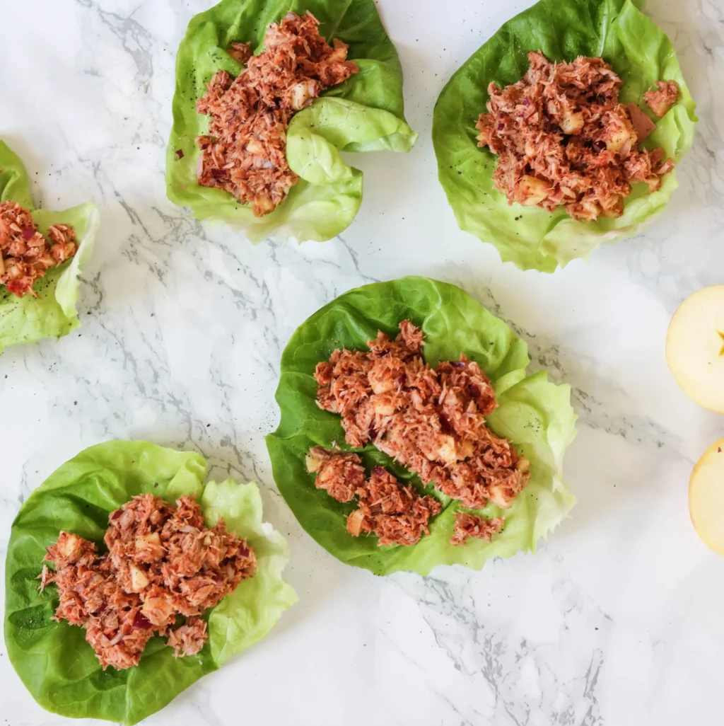 Tuna lettuce wraps open to show filling